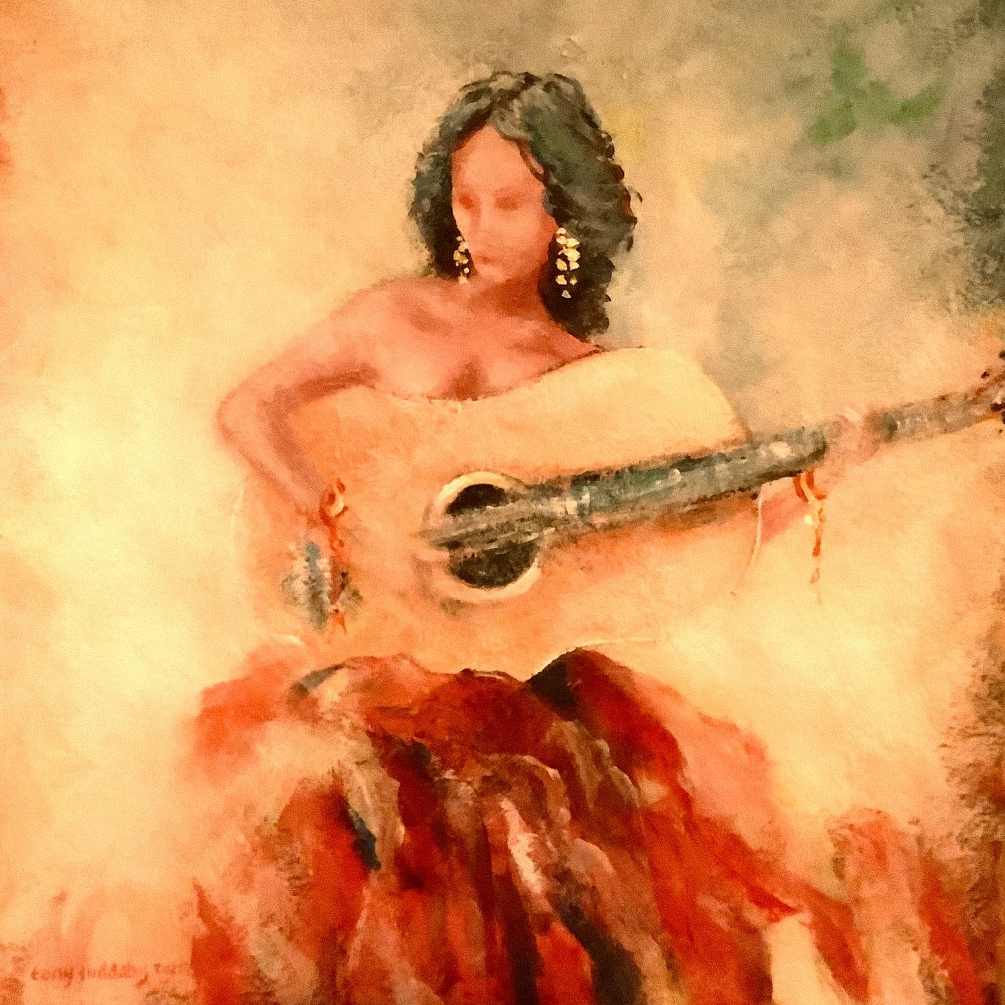 A spanish lady playing her guitar